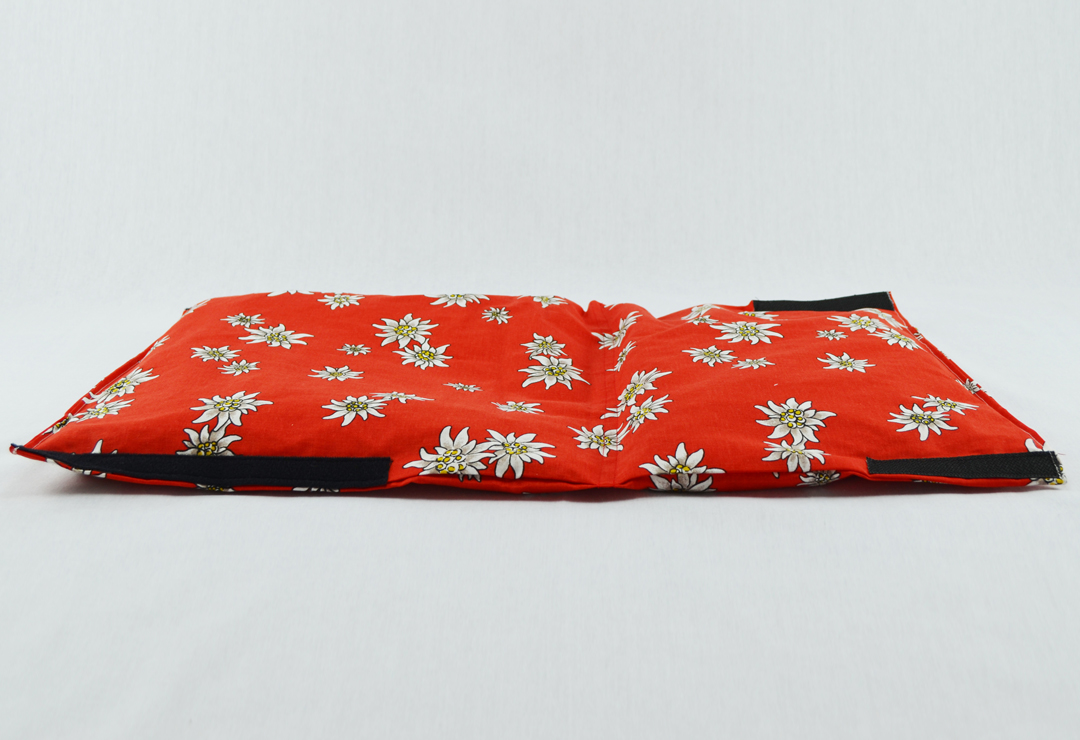 Cherry stone pillow with edelweiss pattern and Velcro fasteners